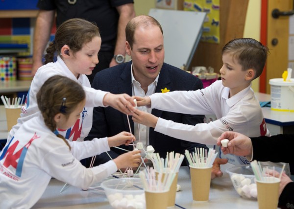 The Duke of Cambridge helps to build a freestanding tower from marshmallows and straws, in the tower build challenge at the launch of the SkillForce Prince William Award today1