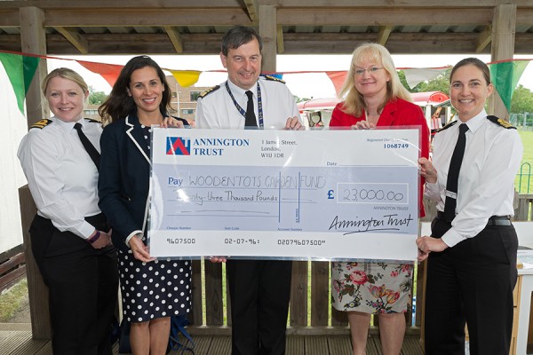 Vice Admiral Jonathan Woodcock OBE, the Second Sea Lord and Deputy Chief of Naval Staff and Anna Wright, Director, NFF receiving a cheque on behalf of Woodentots Nursery from Annington’s Vanessa Farnell