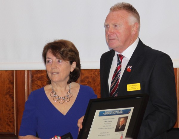 Carol Davies recieving her Founder%27s Day Award from Blind Veterans UK President Colin Willimason