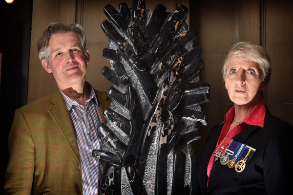 Photo Caption - Lieutenant Colonel Helen Homewood and sculptor Simon Burns-Cox with 'France 1914' at the Kelvingrove Art Gallery today.