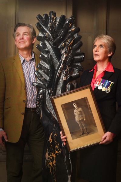 Photo Caption - Lieutenant Colonel Helen Homewood and sculptor Simon Burns-Cox with 'France 1914' at the Kelvingrove Art Gallery today.