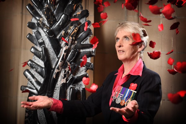 Photo Caption - Lieutenant Colonel Helen Homewood and sculptor Simon Burns-Cox with 'France 1914' at the Kelvingrove Art Gallery today.