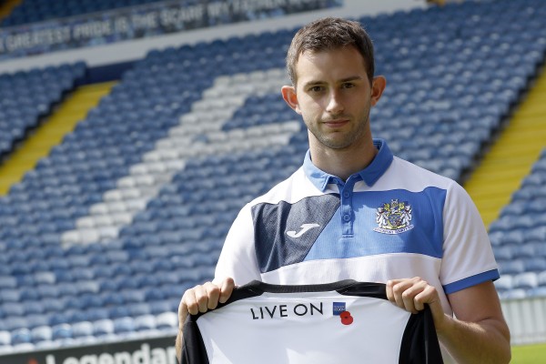 County striker Adam Thomas with the new shirt at Edgeley Park