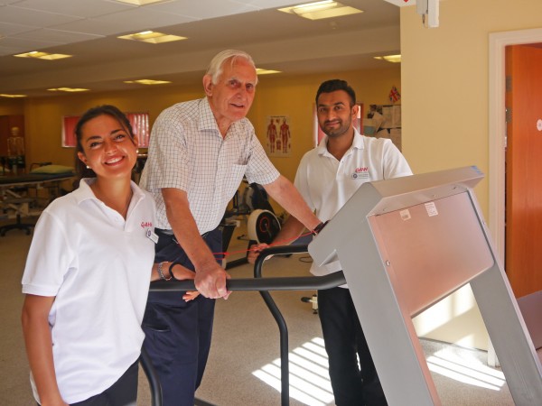 Ex-Serviceman, Hadley Norris, with QAHH Physiotherapists, Camilla Castellini and Karan Dhanak