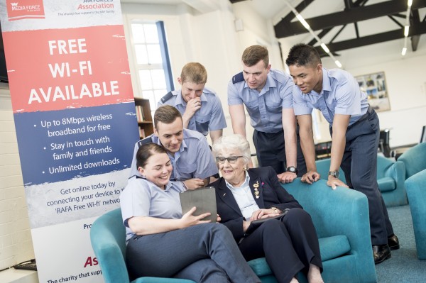 Pictured : Recruits and a RAFA member at RAF Halton enjoy the new free WiFi facilities placed by Mediaforce in partnership with the RAFA (RAF Association) Pictured are RAF phase one recruits awaiting phase two training, AKA Soldiers Awaiting Training (SAT). Enjoy the new free WiFi put into their welfare facilities by Mediaforce in partnership with RAFA (Royal Air Force Association). Note - WiFi is available to all recruits in attendance at RAF Halton, the only personnel available for this event were those awaiting training. Pictured are soldiers: AC Limara Holloway (Age 24)(Female) AC Andy Bruce (28) AC Jordan Beck (26) AC Liam Wilson (20) AC Joshua Barnett (19) AC Javin Mitra (19) NOTE TO DESKS: Photographer : LCpl Pete Dobson (R SIGS) MOD release authorised handout images All images remain Crown Copyright Photo credit to read - LCpl Pete Dobson (R SIGS)