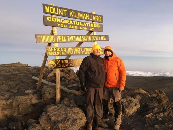 Mark and Russell on top of Mount Kilimanjaro