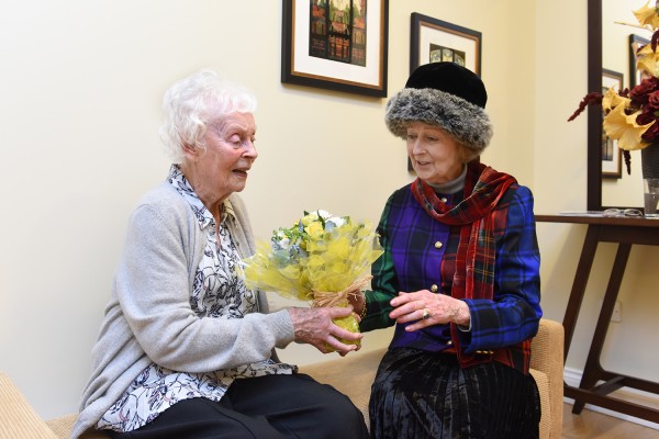 Her Royal Highness Princess Alexandra receiving a posy from WAAF veteran Phyllis