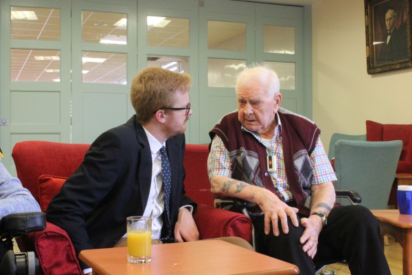 Lloyd Russell-Moyle speaking with blind veteran Fred Tree