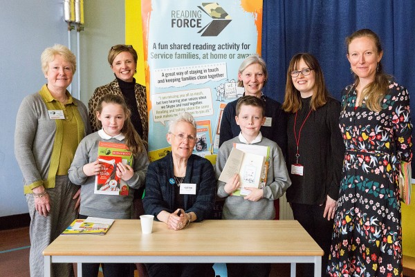 From let to right, Alison Baverstock, founder and Director of Reading Force; Jane Harsham, Business Executive, Annington; Fiona Maxwell, Reading Force; Louise Hill, MOD Support Teacher; Hattie Gordon, Reading Force; author Vivian French; children from Colinton Primary School Credit: Suzanne Heffron 