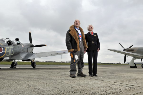 Squadron Leader Allan Scott DFM returned to Biggin Hill today 1.4.18 to mark the 100th anniversary of the RAF and took to the skies in a beloved Spitfire where he performed a flypast and completed at barrel roll over the runway. Allan originally flew from Biggin Hill in 1941, towards the end of the Battle of Britain. Whilst stationed at Biggin Hill Allan met the King on one of his visits. Following his time at Biggin Hill Allan was posted to Malta, which was under siege with continual raids by the Luftwaffe and the RAF were battling against heavy odds. He flew his Spitfire off HMS Eagle to the island on 21st July 1942, wherehe saw much action - including a victory during Operation Pedestal on 13th August.   Squadron Leader Allan Scott DFM is an Ambassador for the Royal Air Force Benevolent Fund, the RAF’s leading welfare charity. This distinguished pilot has been working with the Fund to help raise awareness of the support the charity provides for the veteran community, from financial assistance and housing adaptations to welfare breaks and mobility aids. Last year the charity spent £17.6m supporting more than 55,000 members of the RAF Family. He is pictured with Mary Ellis  aged 101 a former Air Transport Auxiliary pilot who delivered over 1000 aircraft during the Second World War - 400 of them Spitfires. Fiona Ferguson Royal Air Force Benevolent Fund 67 Portland Place, London, W1B 1AR  www.rafbf.org     | M: 07894 479405   --  Adrian Brooks imagewise  -  wise words - clever pictures The Award Winning Photographic Consultancy Imagewise Limited, Deri, Green Dene, East Horsley, Surrey,  KT24 5RE Telephone : 01483 283879  -  Mobile : 07768 696197   Email : adrian@imagewise.co.uk     Website : www.imagewise.co.uk   ￼ ￼ ￼ ￼ ￼ ￼ ￼ ￼ ￼ ￼ ￼ ￼ ￼ ￼ ￼ ￼ ￼ ￼ ￼ ￼ ￼ ￼ ￼ ￼ This phot