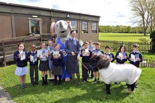 Children meet Ben Elephant and Raphael the unicorn at the launch with OC Base Support Wing, Wing Commander Toria McPhaden