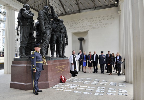 53 pairs of flying gloves pay tribute to the 53 men who made the ultimate sacrifice 75 years ago on the Dambusters raid. This moment of reflection was staged at London’s Bomber Command Memorial, hosted by the Memorial’s guardian and leading RAF welfare charity, the RAF Benevolent Fund Tomorrow a gala screening of The Dam Busters film will be live at the Royal Albert Hall and simulcast throughout cinemas competed by historian Dan Snow who will conduct a ‘bouncing bomb experiment’ on stage and speak to relatives of those who took part. Tickets rafbf.org/dambusters . Pictured is Flight Lieutenant Nigel Painter who joined the service and tribute today. This photo may only be used in for editorial reporting purposes for the contemporaneous illustration of events, things or the people in the image or facts mentioned in the caption. Re-use of the picture may require further permission from the copyright holder. Photo credit should read: Adrian Brooks/Imagewise