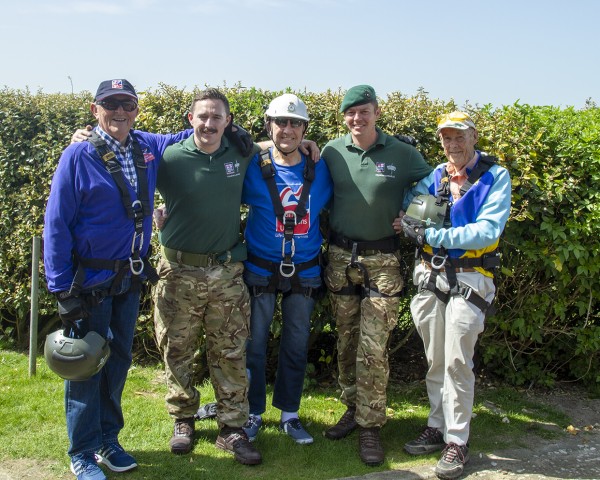 Tony Harbour (centre) with Marines and fellow blind veterans Graham Forshaw (far left) and Vic Ashlee (far right)