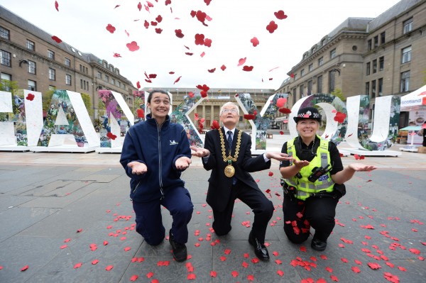 MILITARY CHARITIES CALL ON COUNTRY TO SAY ÔTHANK YOUÕ TO WW1 GENERATION Photo Caption:- (L) Sarah King from Michelin and PC Victoria OÕNeil with DundeeÕs Lord Provost Ian Borthwick in Dundee today. Members of Royal British Legion Scotland and Poppyscotland along with senior figures from Dundee city Poppyscotland and Legion Scotland today launched a mass movement to say ÒThank YouÓ to all who served, sacrificed and changed our world during the First World War. With fewer than 100 days to go until 11th November, the charities are calling on mass involvement from the public to mark the centenary of the end of World War One. To launch the Thank You movement, a giant installation of eight-foot-high illustrated letters appeared in DundeeÕs City Square. The public were invited to write their own personal messages of thanks directly on to the installation. Dundee was chosen for the Scottish launch of Thank You as the city exemplified the collective effort made across Scotland, Britain and the Commonwealth, not only on the front line, but, importantly, on the home front as well. The city had among the highest enrolment rate of any town in Britain, with an estimated 63 per cent of eligible men signing up. This equated to 30,490; more than 4,200 of whom made the ultimate sacrifice and thousands more who returned with devastating injuries. As a result of the high enrolment rate, women quickly answered the call and entered the many jute and munitions factories, and various engineering works.