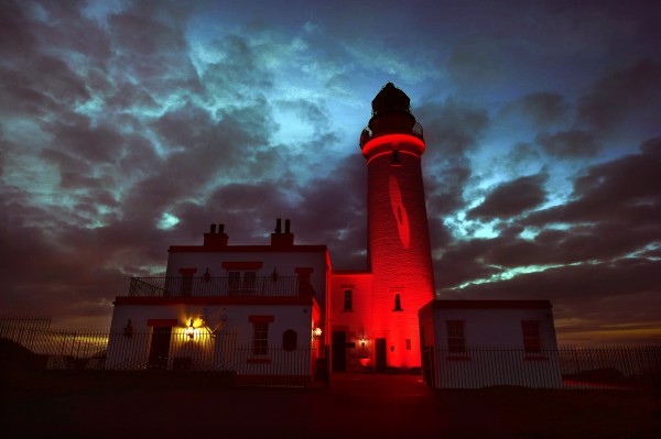 © Sandy young Photography 07970 268944 The Halfway House, Turnberry Lighthouse lit up red with a poppy for Remembrance Day E: sandy@scottishphotographer.com W: www.scottishphotographer.com